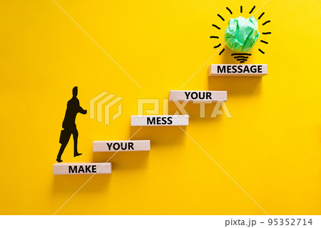 Business concept growth success process. Wood blocks stacking as step stair on yellow background, copy space. Businessman icon. Words 'make your mess your message'. Conceptual image of motivation. Business concept growth success process. Wood blocks stacking as step stair on yellow background, copy space. Businessman icon. Words 'make your mess your message'. Conceptual image of motivation. 95352714