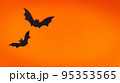 Orange cute Halloween background design with bats silhouettes copy space 95353565