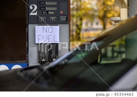 A sign at a gas station says No Fuel. No gasoline at the gas station due to the economic crisis. A sign at a gas station says No Fuel. No gasoline at the gas station due to the economic crisis. 95354463