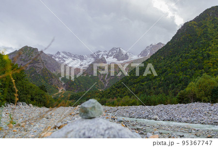 Mountain river in Ossetia, Tana glacier in the mountains. Caucasus mountains. 95367747