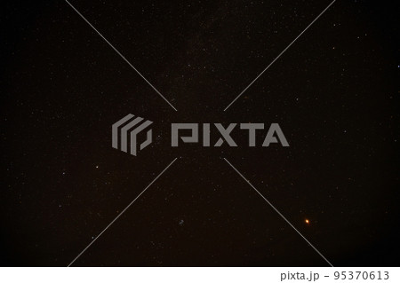 Dark night sky with stars above Arctic circle in autumn season. 95370613