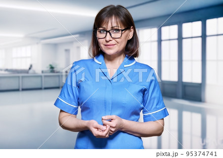 Portrait of a female nurse inside the hospital 95374741