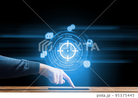 The concept of business goals and achieving goals. Hologram over the tablet by the managing person. The concept of business goals and achieving goals. Hologram over the tablet by the managing person. 95375445