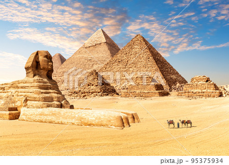 The Great Sphinx next to the Pyramids of Egypt in the desert of Giza 95375934