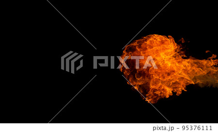 Fire blasts on black background, close-up Fire blasts on black background, close-up 95376111
