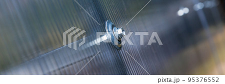 Modern greenhouse details. Connection of polycarbonate 95376552