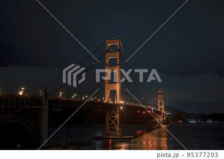 Famous Golden Gate Bridge in San Francisco at night, USA. Beautiful San Francisco. Famous Golden Gate Bridge in San Francisco at night, USA. Beautiful San Francisco. 95377203
