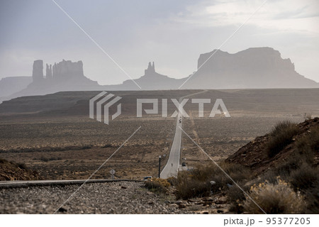 Amazing timelapse view of the infinite road near Monument Valley, Arizona, USA. Scenic views of Monument Valley. 95377205