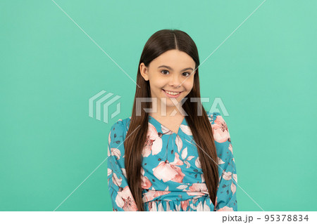 All the taste of being a girl. Happy girl child smile blue background. Girlhood and childhood 95378834