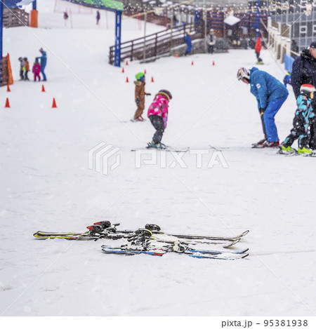 Abstract blurred view of ski resort and children sport school. Concept of winter holidays and leisure, winter season Abstract blurred view of ski resort and children sport school. Concept of winter holidays and leisure, winter season 95381938