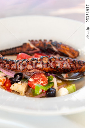 Fried Octopus with Greek Salad Fried Octopus with Greek Salad 95381957