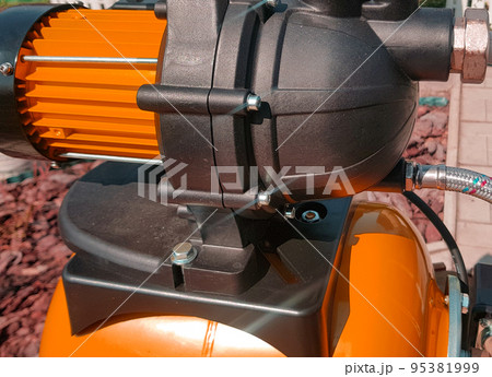 New water pumping station, household automatic station, yellow color, close-up. Application of house, country house, village, cottage New water pumping station, household automatic station, yellow color, close-up. Application of house, country house, village, cottage 95381999