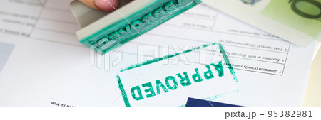 Stamp approved on a document for a visa to Europe 95382981