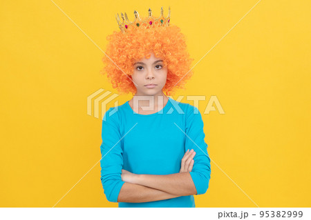 serious teen girl in fancy clown wig wear queen crown, egocentric serious teen girl in fancy clown wig wear queen crown, egocentric 95382999