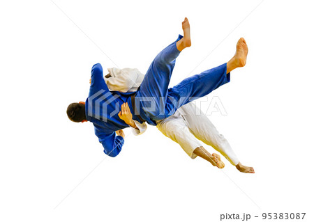 judoka throws his opponent in judo competitive 95383087