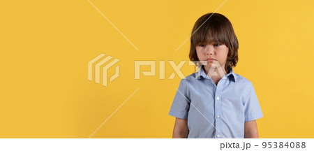 Unhappiness and kids stress. Little unhappy boy feeling upset, standing with crying eyes, panorama with empty space Unhappiness and kids stress. Little unhappy boy feeling upset, standing with crying eyes, panorama with empty space 95384088
