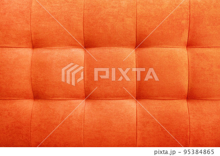 Orange suede leather background, classic checkered pattern for furniture, wall, headboard Orange suede leather background, classic checkered pattern for furniture, wall, headboard 95384865