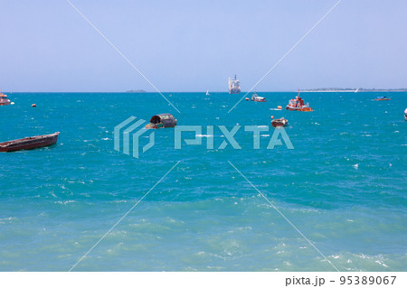 Waves of the ocean near the port. Port buoys. Waves of the ocean near the port. Port buoys. 95389067