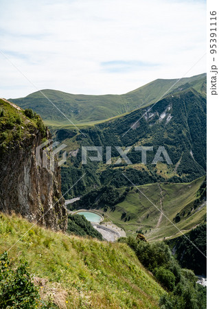 Gergeti Trinity Church infront of the Kaukasus Mountains in Georgia 95391116