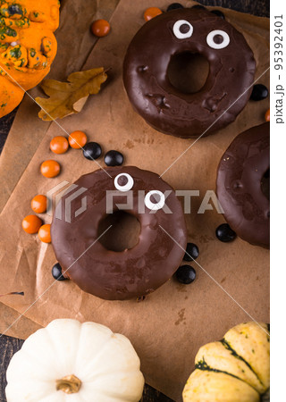 Halloween festive donuts with eyes. Halloween festive donuts with eyes. 95392401