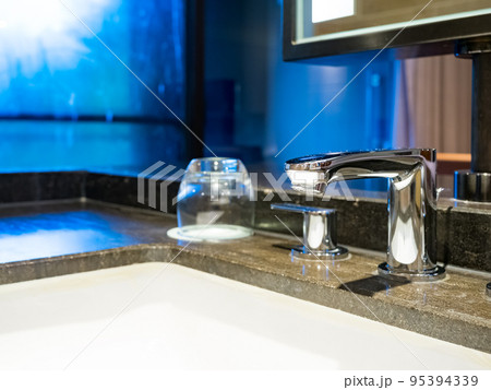 Interior of bathroom with washbasin and faucet. Interior of bathroom with washbasin and faucet. 95394339