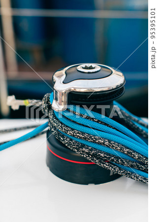 Yacht rigging, sailboat winch and rope. Vertical photo. Yacht rigging, sailboat winch and rope. Vertical photo. 95395101