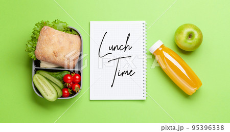 Lunch box with sandwich, vegetables and juice Lunch box with sandwich, vegetables and juice 95396338
