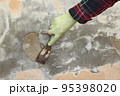 Old damaged mortar scraping, removal 95398020