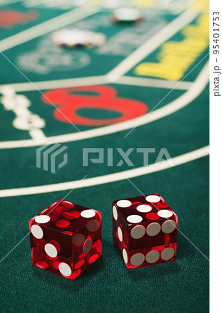Dice on a craps table 95401753