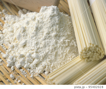 Handful of wheat flour isolated on white Handful of wheat flour isolated on white 95402028