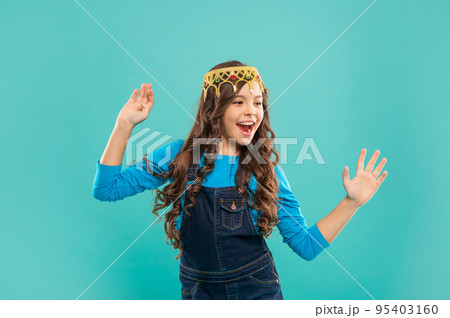 egoistic teen girl wear diadem. arrogance and selfishness. portrait of glory. glad child in crown. egoistic teen girl wear diadem. arrogance and selfishness. portrait of glory. glad child in crown. 95403160