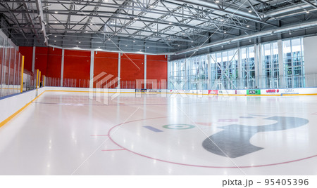 Riga, Latvia. July 10, 2022. Empty hockey rink sport arena ice and light 95405396