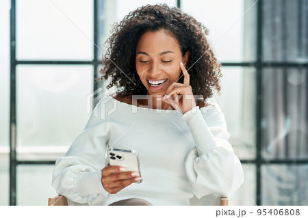 business woman looking at the screen of her smartphone. business woman looking at the screen of her smartphone. 95406808