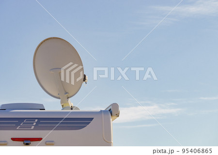 Satellite dish on roof of caravan 95406865