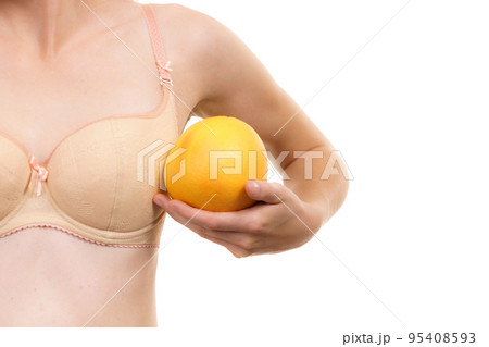 Woman Small Boobs Holds Big Orange Fruits Stock Image - Image of  enlargement, care: 186667371