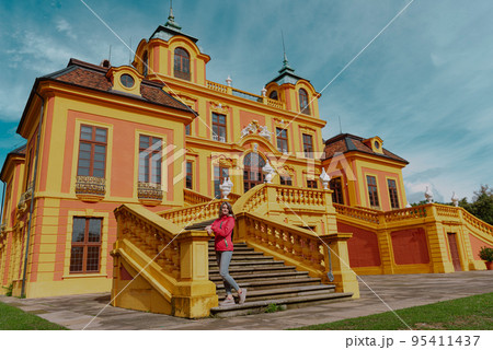 Beautiful Girl Posing Near Favorite Palace At Ludwigsburg, Germany. Favorite Castle Is The Oldest German Porcelain Castle Near The Village Of Forch Near Rastatt. Schloss Favorite, Baden-Wuerttemberg. 95411437