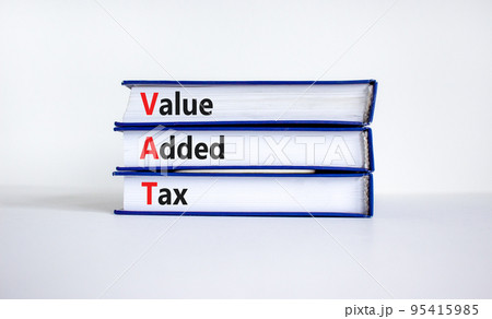 VAT, value added tax symbol. Books with concept words 'VAT, value added tax'. Beautiful white background, copy space. Business and VAT, value added tax concept. VAT, value added tax symbol. Books with concept words 'VAT, value added tax'. Beautiful white background, copy space. Business and VAT, value added tax concept. 95415985
