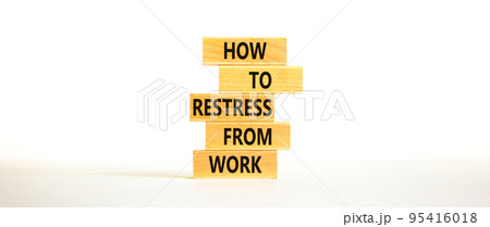 Restress from work symbol. Concept words How to restress from work on wooden blocks. Beautiful white table white background. Copy space. Psychological business restress from work concept. Copy space. 95416018