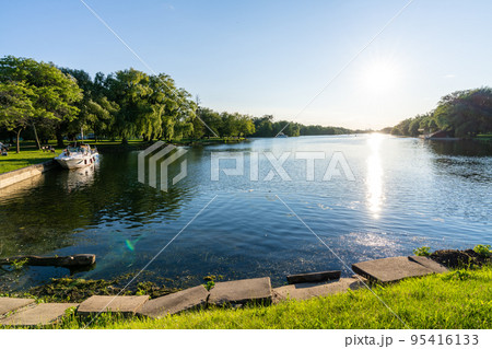 Toronto, Ontario, Canada - July 30 2021 : Toronto Islands Park Centre Island Long Pond. Toronto, Ontario, Canada - July 30 2021 : Toronto Islands Park Centre Island Long Pond. 95416133