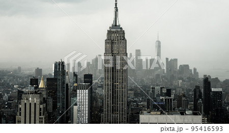 Black and white photograph of the rooftops of downtown New York in classic noir style Black and white photograph of the rooftops of downtown New York in classic noir style 95416593