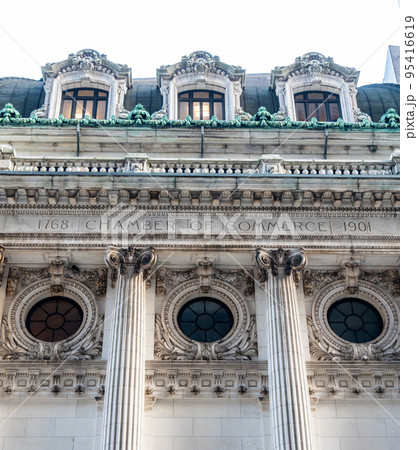 The inscription on the facade of the chamber of commerce building in the financial district of Manhattan 95416619