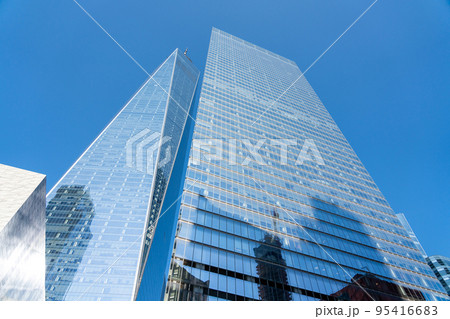 The towering skyscrapers of the financial center of New York against the blue sky 95416683