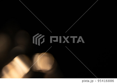 colorful golden crystal light leaks on black background 95416886