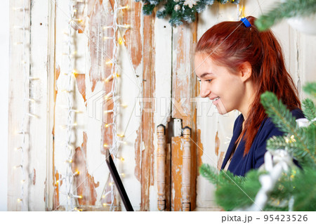 Happy caucasian youn woman portrait. Using laptop. Happy caucasian youn woman portrait. Using laptop. 95423526
