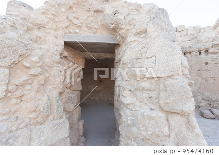 Mount Herodion and the ruins of the fortress of King Herod inside an artificial crater. The Judaean Desert, West Bank. 95424160