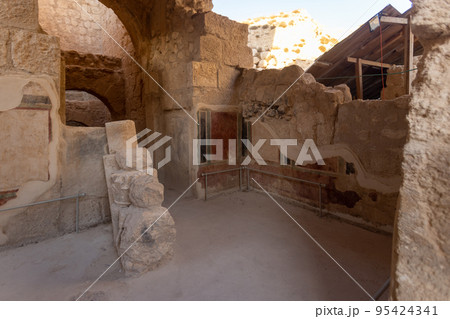 Mount Herodion and the ruins of the fortress of King Herod inside an artificial crater. The Judaean Desert, West Bank. 95424341