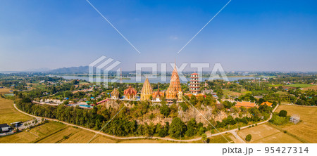 Panorama landscape area view of Tiger Cave Temple or Wat Tham Sua in Kanchanaburi, Thailand is very popular with tourists and foreigners 95427314
