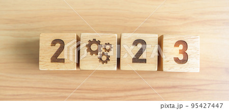 2023 block with gear icon. Business Process, Team, teamwork, Goal, Target, Resolution, strategy, plan, Action, motivation, change, brainstorm and New Year start concepts 2023 block with gear icon. Business Process, Team, teamwork, Goal, Target, Resolution, strategy, plan, Action, motivation, change, brainstorm and New Year start concepts 95427447