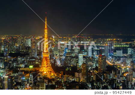 Cityscape of Tokyo skyline area with many modern high-rise buildings at night Cityscape of Tokyo skyline area with many modern high-rise buildings at night 95427449