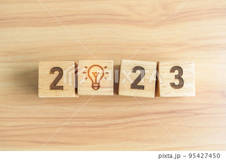 2023 block with lightbulb icon. Business Idea, Creative, Thinking, brainstorm, Goal, Resolution, strategy, plan, Action, change and New Year start concepts 2023 block with lightbulb icon. Business Idea, Creative, Thinking, brainstorm, Goal, Resolution, strategy, plan, Action, change and New Year start concepts 95427450